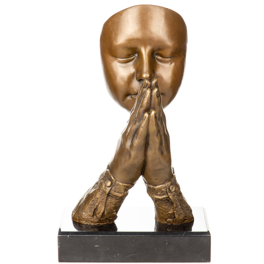 Statue en bronze d'un visage en méditation